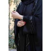  A wide abaya with a different cut model ( 144 ), fig. 2 